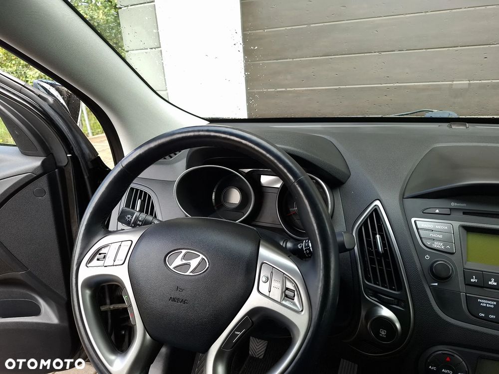 Hyundai ix35 1.7 CRDi 2WD blue Finale Gold - 8