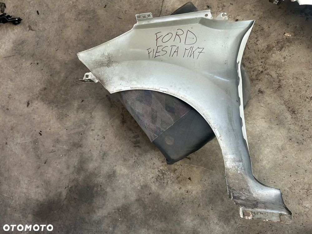 BŁOTNIK LEWY PRAWY PRZÓD FORD FIESTA MK7 - 13