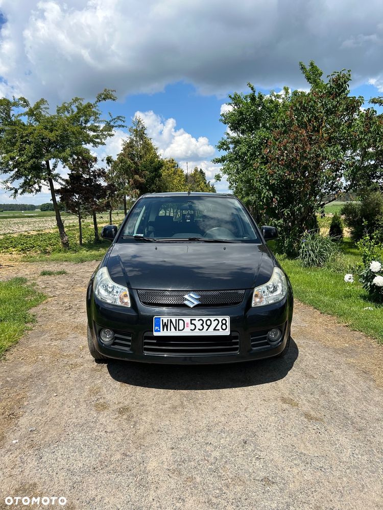 Suzuki SX4 1.6 GLX / Comfort - 1