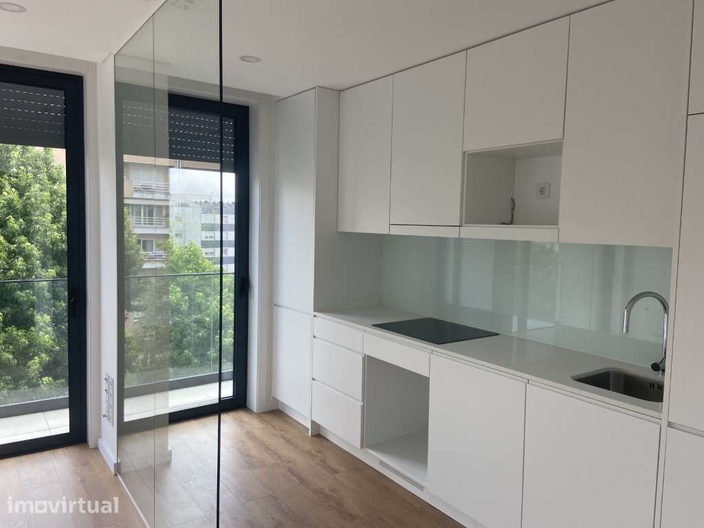 Apartamento T1 - Novo / c/ Garagem - Faculdades / Hospital S. João - Grande imagem: 2/13
