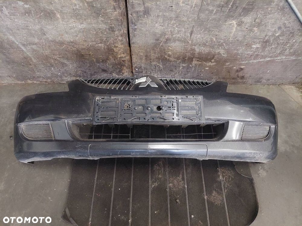 ZDERZAK PRZÓD MITSUBISHI LANCER VII A02A - 1