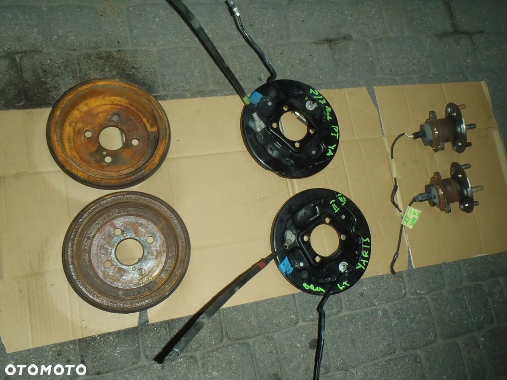 bęben szczęki cylinderek rozpierak hamulec tylny osłona tarcza kotwiczna kostka abs z zawieszenie tył toyota yaris II III 2 3 jak nowe - 4
