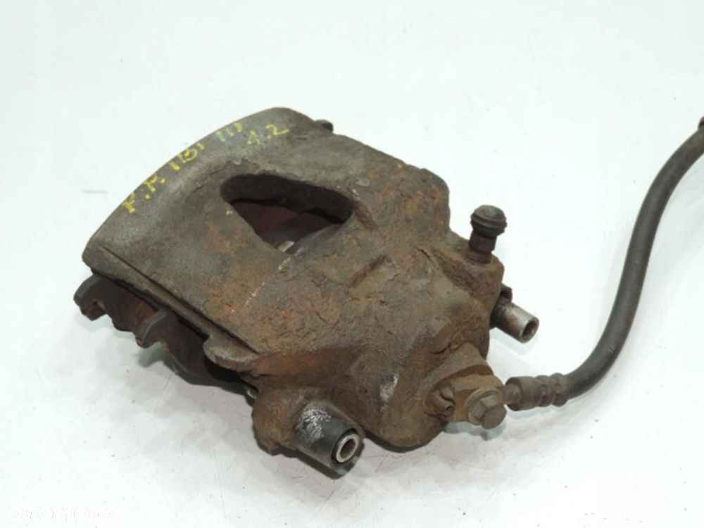 ZACISK HAMULCOWY PRAWY PRZÓD SEAT IBIZA III 1.2 - 4