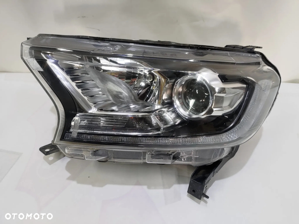 FORD RANGER V LIFT LAMPA LEWY PRZÓD XENON PRZERYSOWANY KLOSZ