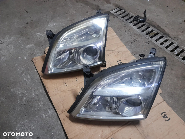 Opel lampa przednia lewa 155887-00