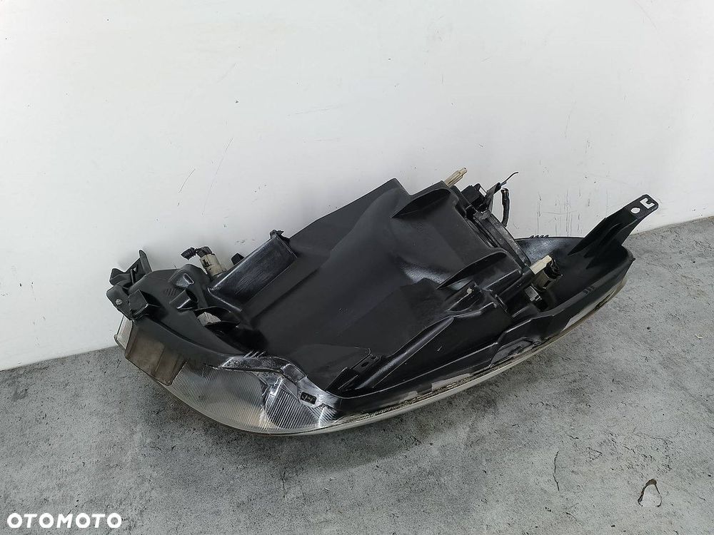 LAMPA PRZÓD PRAWA NISSAN NOTE I 260109U10A 89902135 - 3