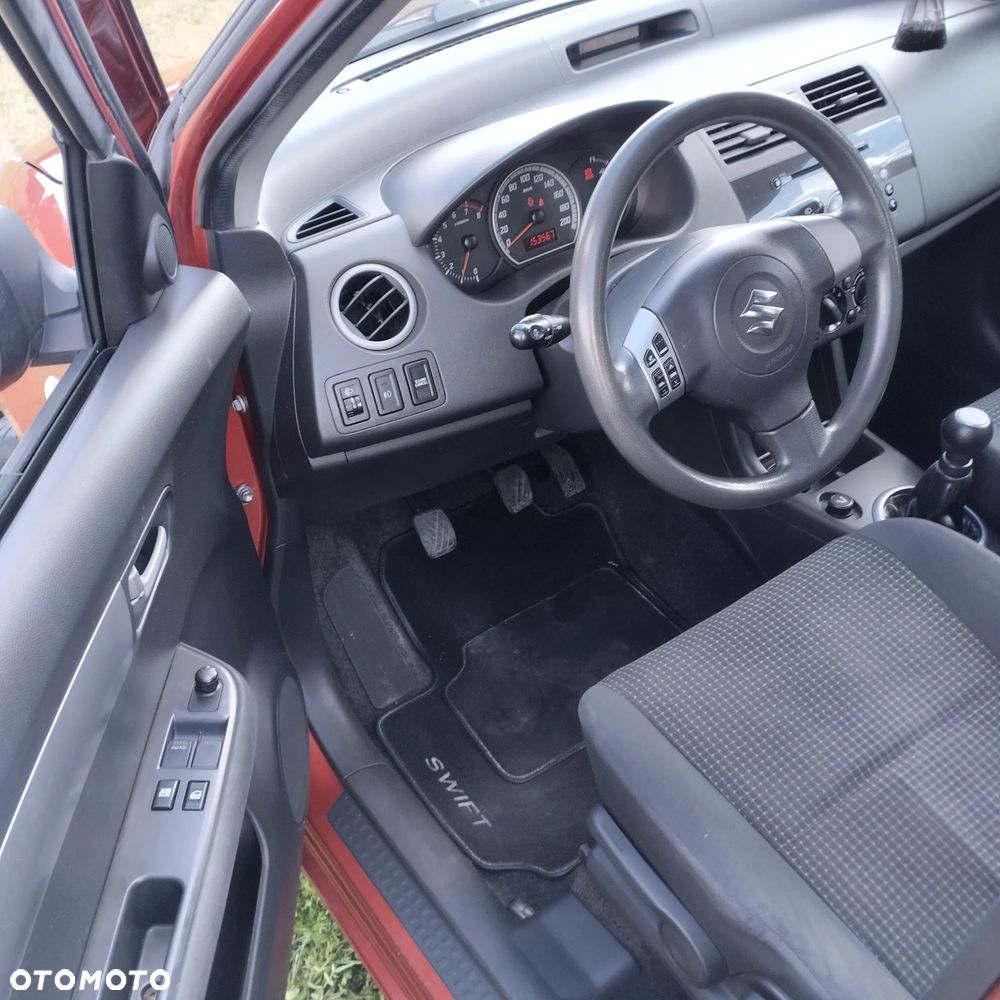 Suzuki Swift 1.3 GLX / Comfort - 11
