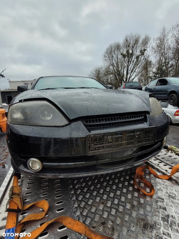 Części- Hyundai Coupe  Pojemność: 1975 Moc: 105kW  Rok: 2004  Benzyna - 8