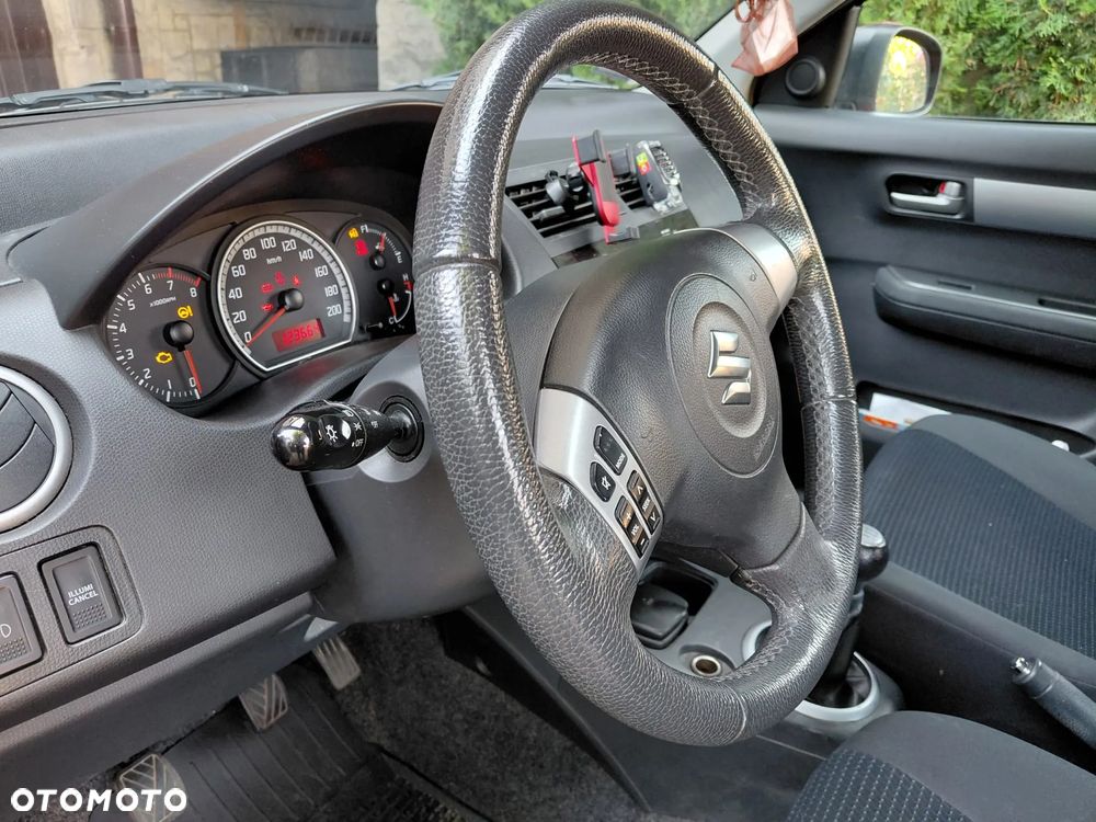 Suzuki Swift 1.3 Club - 10