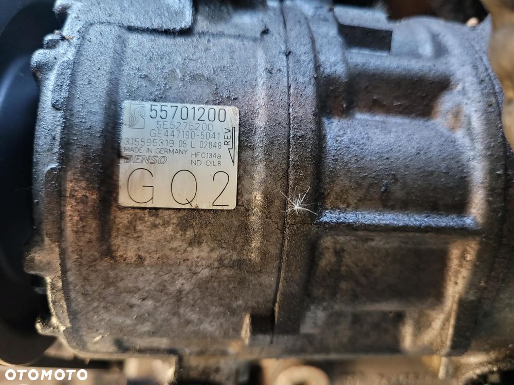 Kompresor klimatyzacji Denso 55701200 Corsa D 2009r. 1.0 benzyna