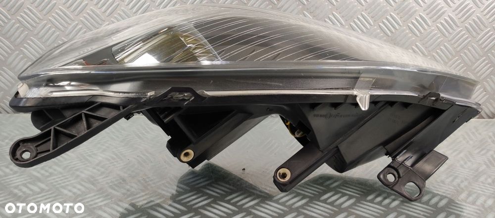lampa reflektor lewy lewa przód przednia OPEL ZAFIRA B II 2 2005- EUROPA - 9