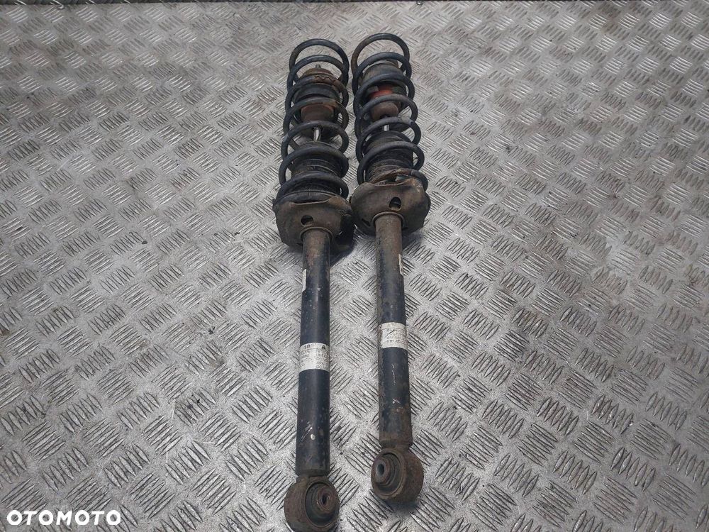AMORTYZATOR + SPRĘŻYNA LEWY TYŁ + PRAWY TYŁ MAZDA DEMIO I D27828700C - 5
