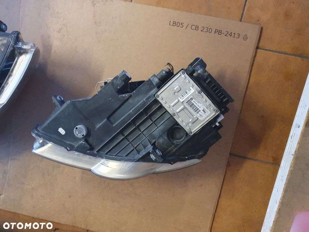 REFLEKTOR L/P VW PASSAT B6 BI XENON - 10
