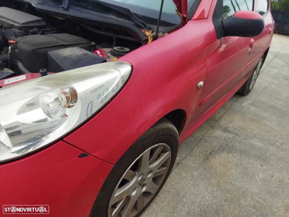 GUARDA-LAMAS FRONTAL ESQUERDO PEUGEOT 206+ 2010 - - 2