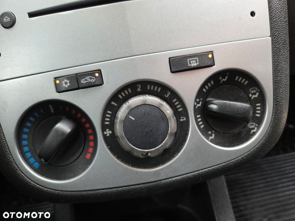 Opel Corsa 1.2 16V Enjoy - 24