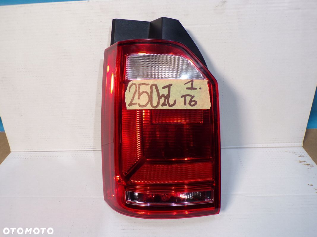 VW T6 TRANSPORTER CARAVELLE 15- lampa tylna tył LEWA wersja z KLAPĄ - 1