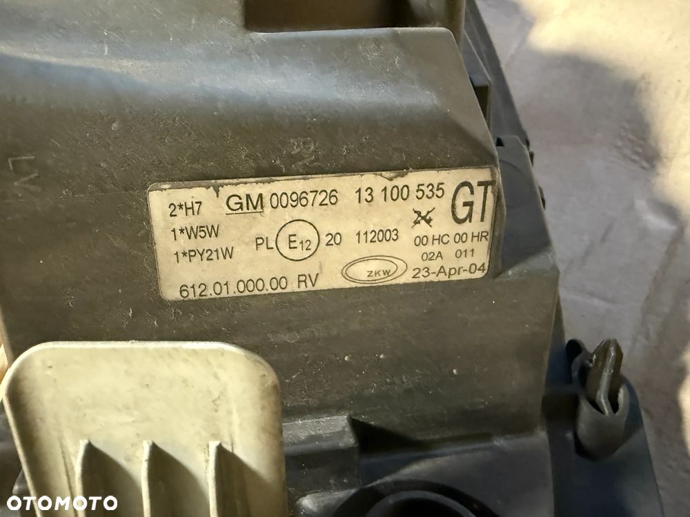 Lampa Opel Corsa C lift 13100536 prawa 13100535 lewa OE - 4