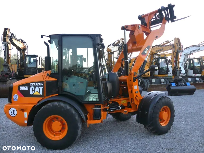Caterpillar CAT 906H / Z Niemiec / 6424mtg / - 35