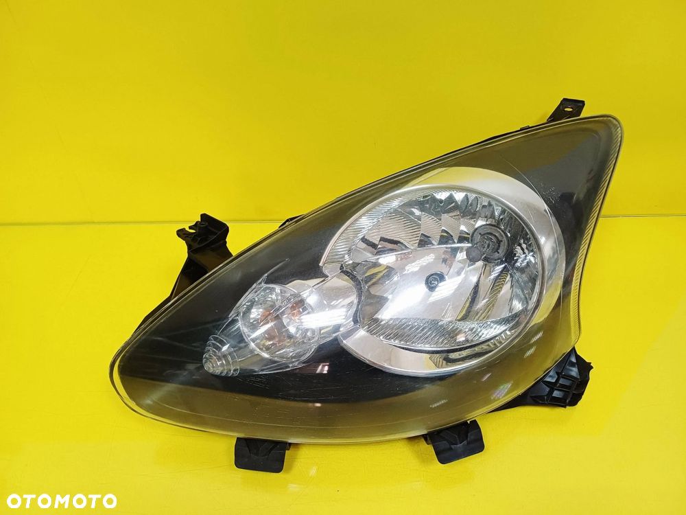 REFLEKTOR LAMPA LEWY PRZÓD TOYOTA AYGO I 89032404 / 81150-0H010 NR46 - 1