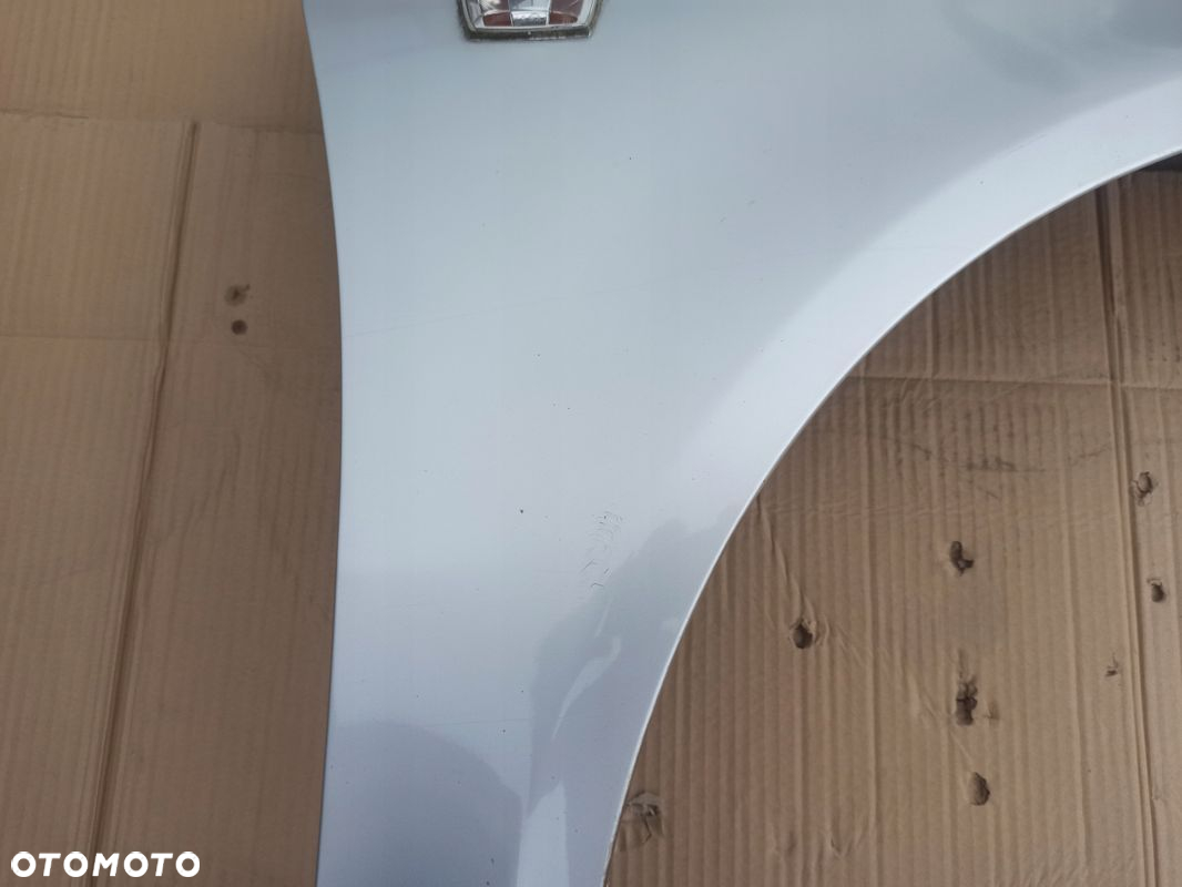 Błotnik prawy przód OPEL CORSA D Z157 06-11 - 4