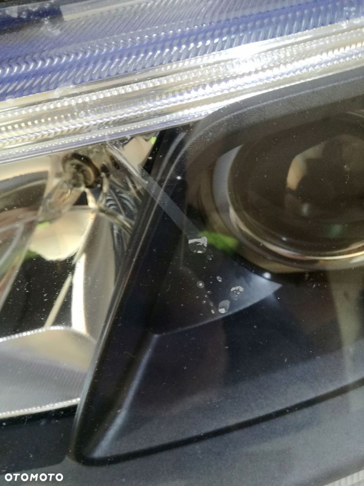 saab 93 9-3 lift lampa reflektor lewa europa 07/12 - 2