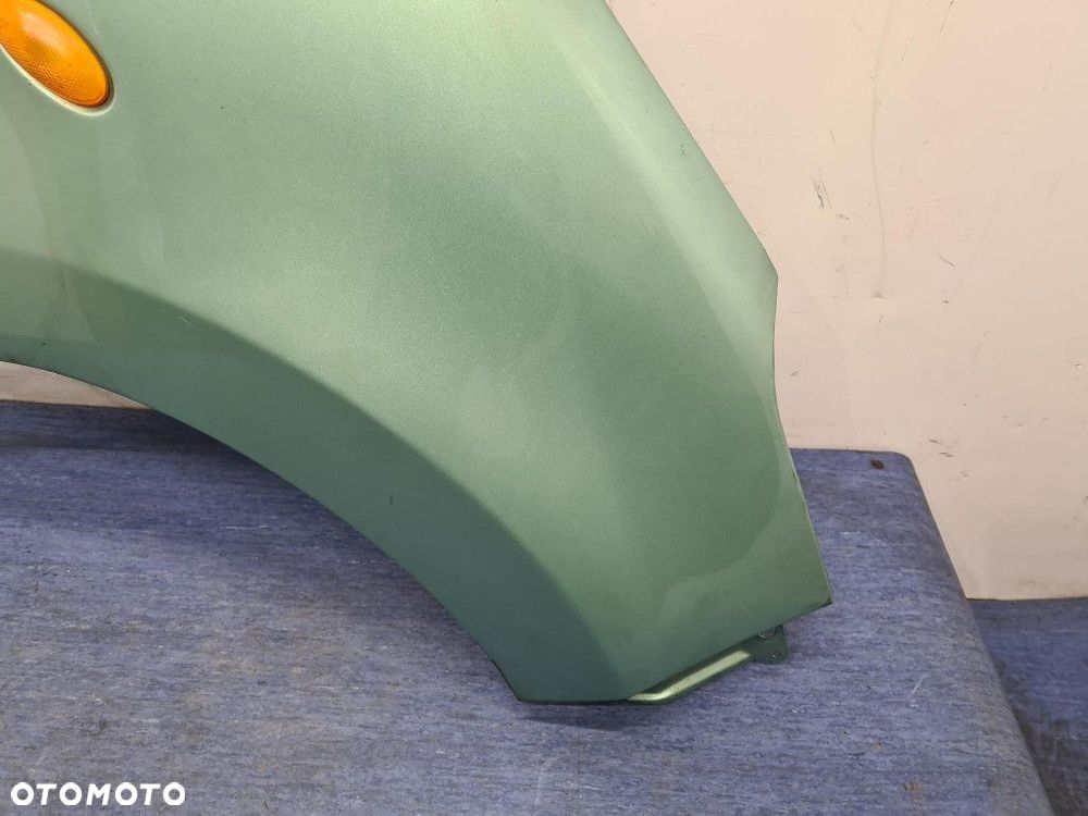 SUZUKI ALTO VII BŁOTNIK PRZÓD PRAWY  ZKZ - 2