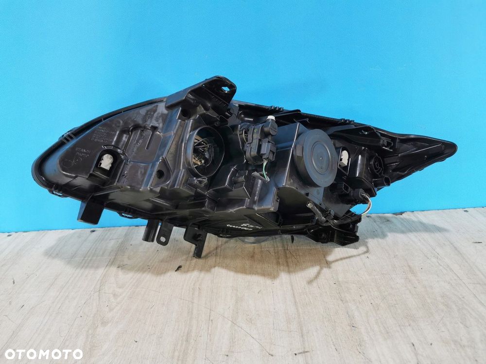 Renault Laguna III 3 lampa reflektor przód prawa Anglik - 3