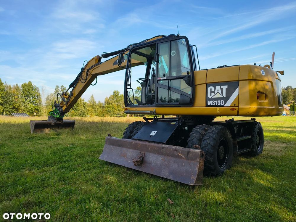 Caterpillar M313D - 13