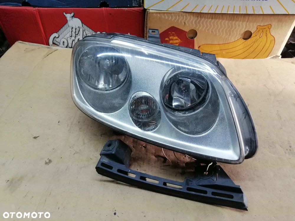 Volkswagen Caddy Touran lampy oryginał komplet 2K0941005B 2K0941006B - 2