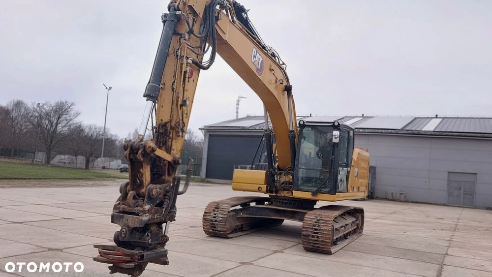 Caterpillar 323 I - 12