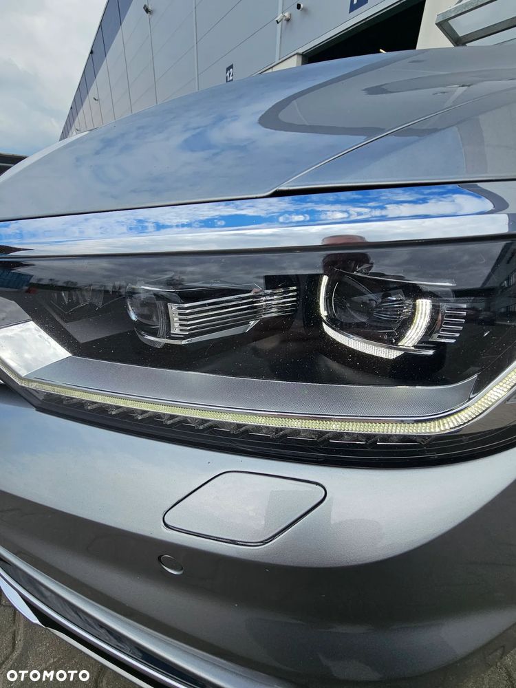 Volkswagen Passat 1.6 TDI SCR DSG Conceptline - 14
