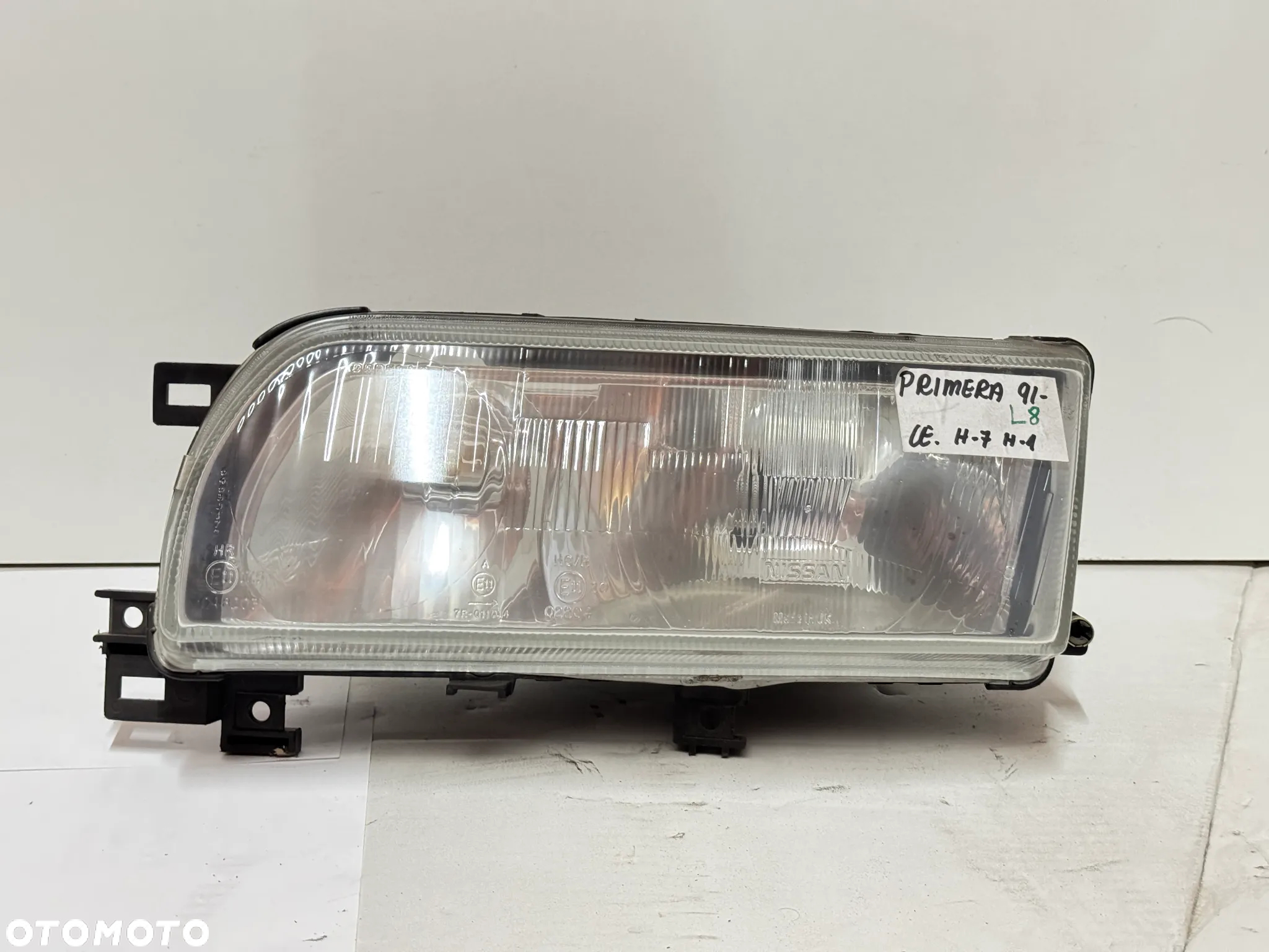 LAMPA REFLEKTOR GŁÓWNY LEWY NISSAN PRIMERA 1991- - 2