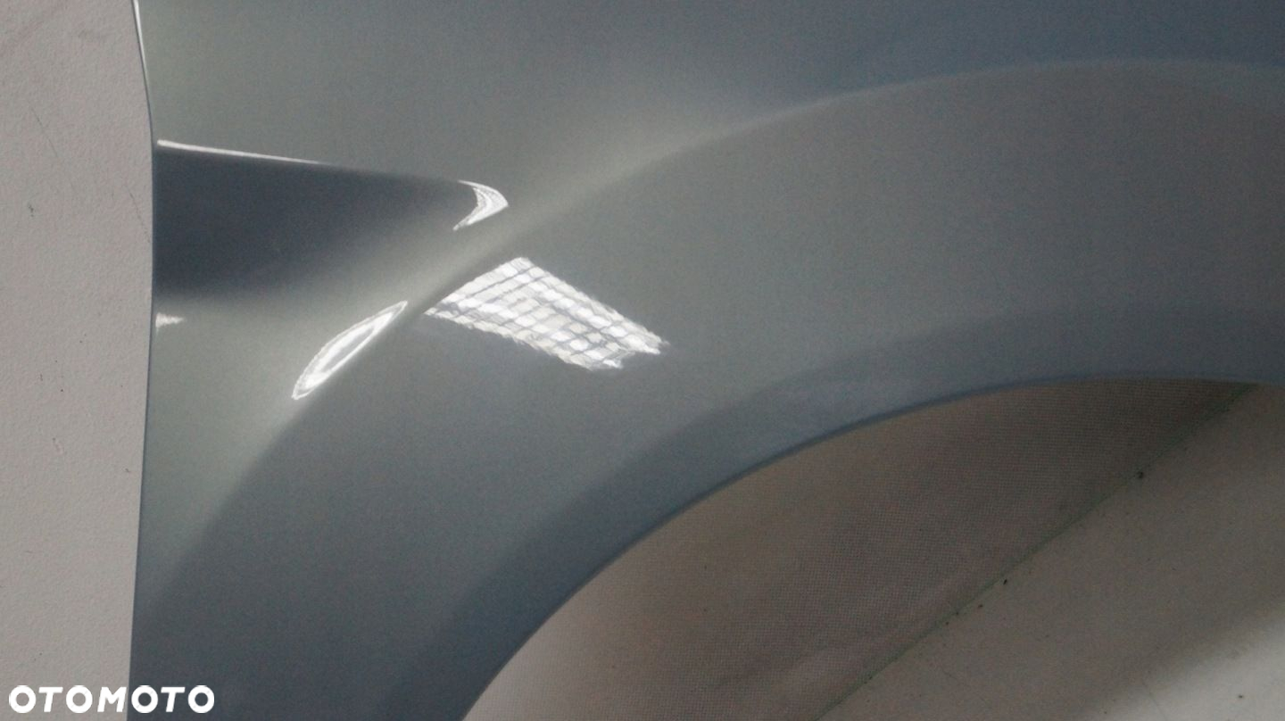 BŁOTNIK PRZEDNI PRAWY FORD FIESTA MK7 79 - 5