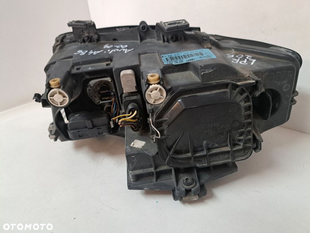AUDI A4 B6 LAMPA PRAWA PRZÓD PRZEDNIA EU SOCZEWKA 8E0941004 00-04 - 8