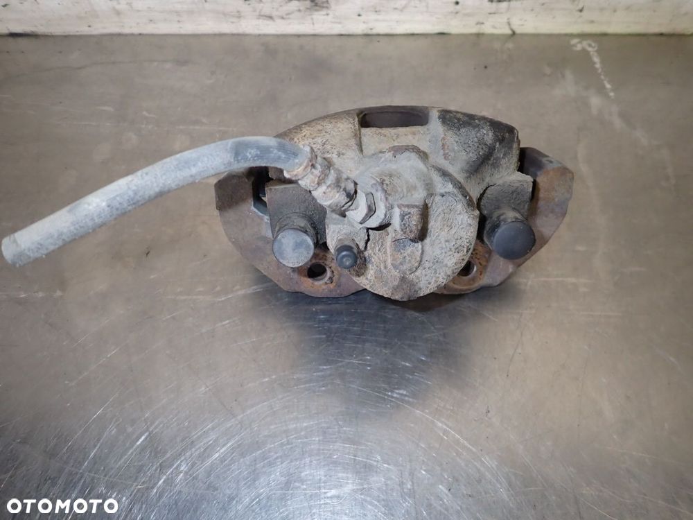 ZACISK HAMULCA LEWY PRZÓD MAZDA 5 2.0 - 2