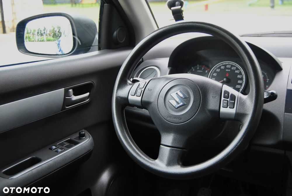 Suzuki Swift 1.3 Club - 10