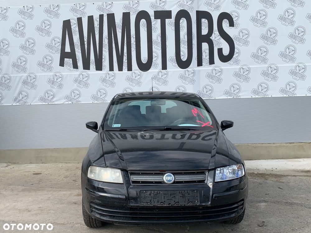 FIAT STILO 2006 *SAMOCHÓD NA CZĘŚCI* 2521  MASKA, LAMPA, DRZWI, LUSTERKO, ZDERZAK, GRILL, BŁOTNIK, KLAPA, BELKA, DESKA, FOTELE, KANAPA, ĆWIARTKA, KIEROWNICA, TARCZE, ZACISKI, ZAWIESZENIE, KOMPLETNY PRZÓD, KOMPLETNY TYŁ, LICZNIK, ZEGARY, PRAWE LEWE PRZÓD TYŁ - 4