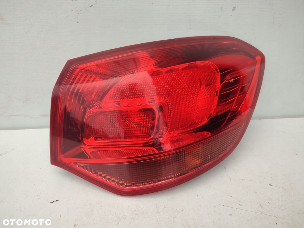 Lampa prawy tył OPEL ASTRA J IV LIFT KOMBI W BŁOTNIK EUROPA ORYGINAŁ - 1