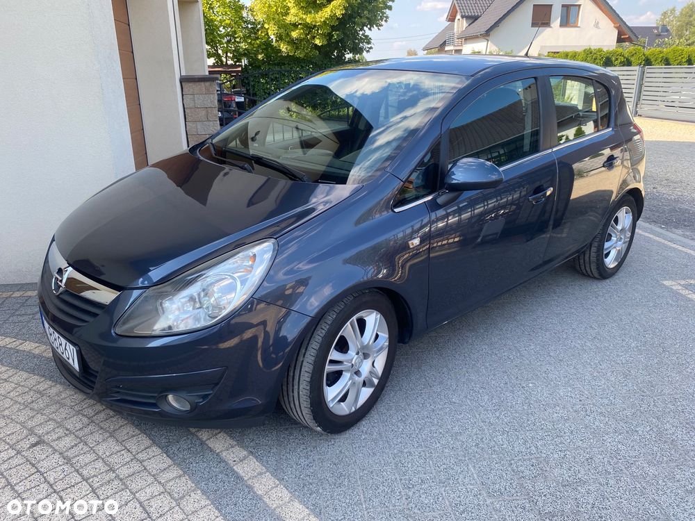 Opel Corsa 1.2 16V Cosmo - 1
