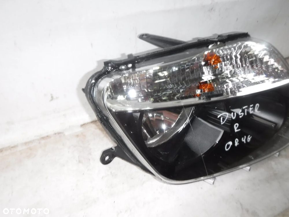 dacia duster 1 lampa przód prawa nowa oryginał przednia - 4