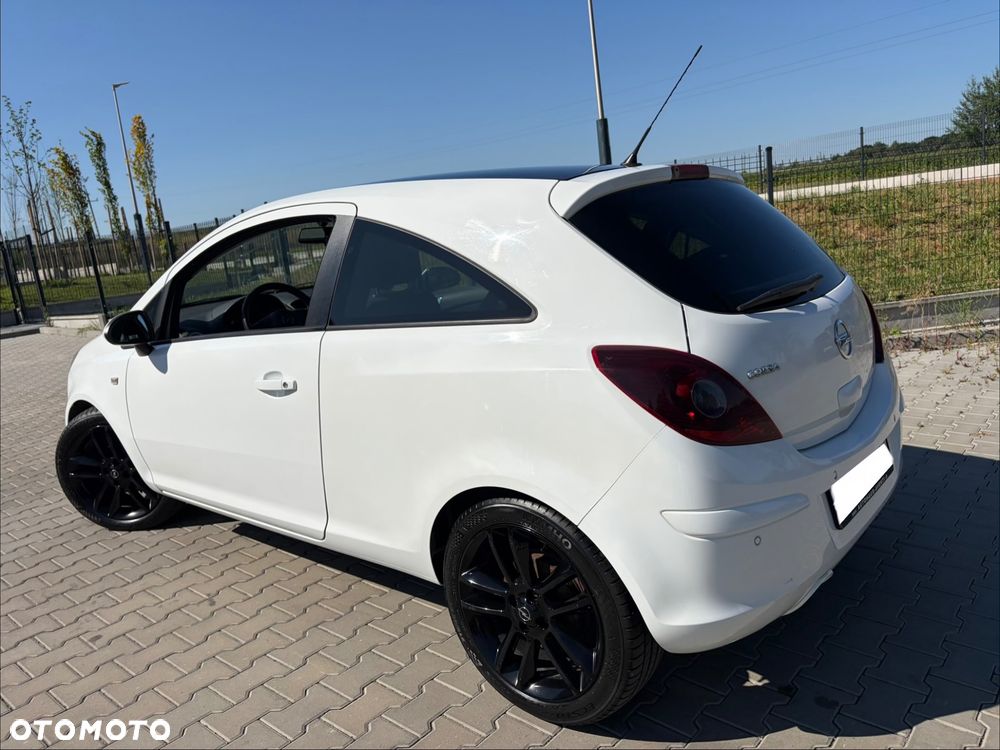 Opel Corsa 1.4 16V Cosmo - 11