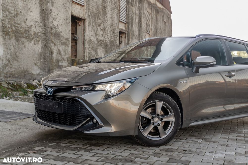 Toyota Corolla 1.8 HSD Exclusive - 23