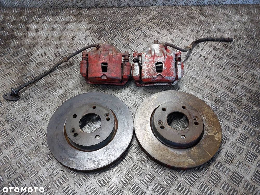 TARCZE HAMULCOWE PRZÓD + KLOCKI + ZACISKI HYUNDAI TUCSON I 2.0 CRDI - 1