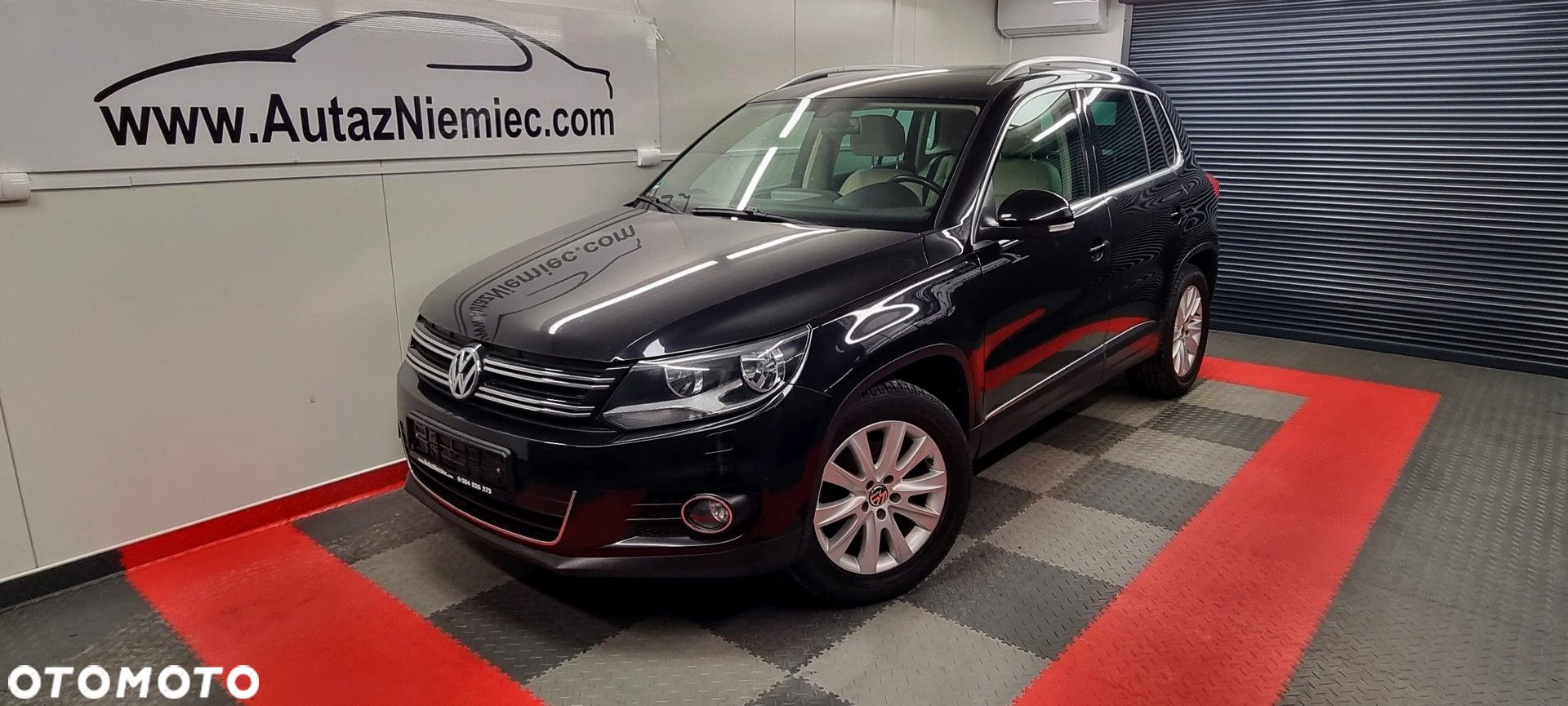 Volkswagen Tiguan 1.4 TSI Sport&Style - 1