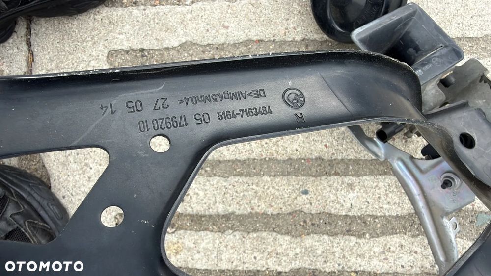 OKULAR PASA PRZEDNIEGO PRAWY 7163484 BMW E61 E60 - 2