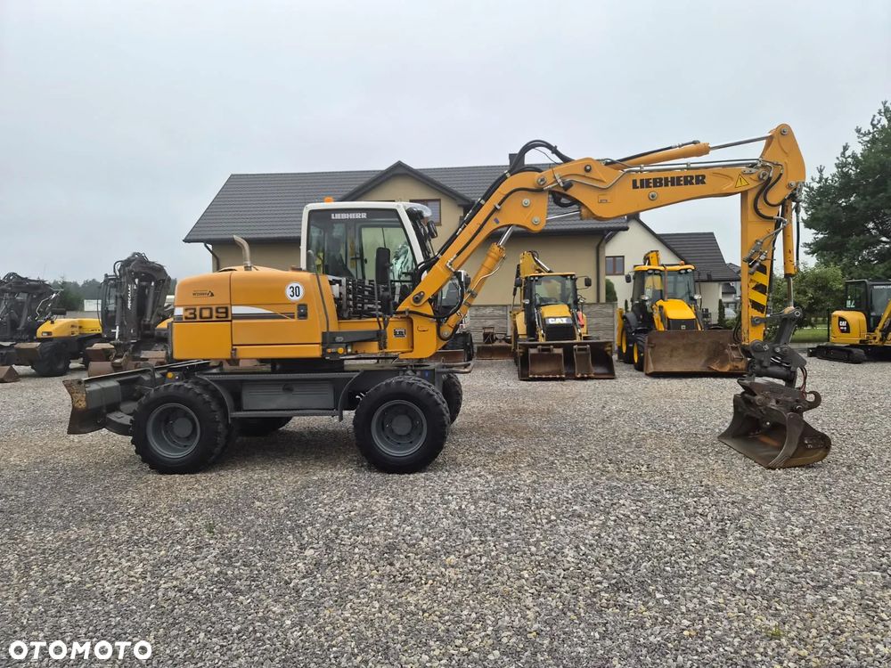 Liebherr A 309 Litronic - 1