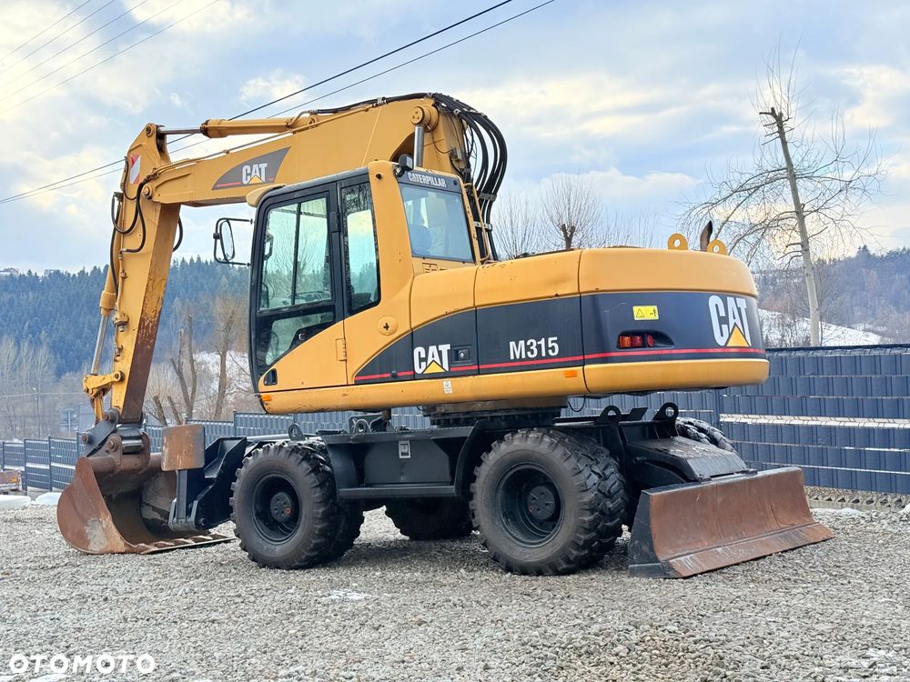 Caterpillar CAT M315C  CATERPILLAR SPROWADZONY  Bardzo Dobry Stan - 10