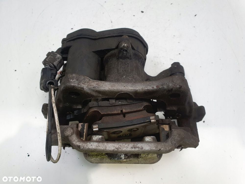 Toyota Corolla XII E21 TYLNY ZACISK HAMULCOWY prawy tył PASAŻERA A006B119B - 6