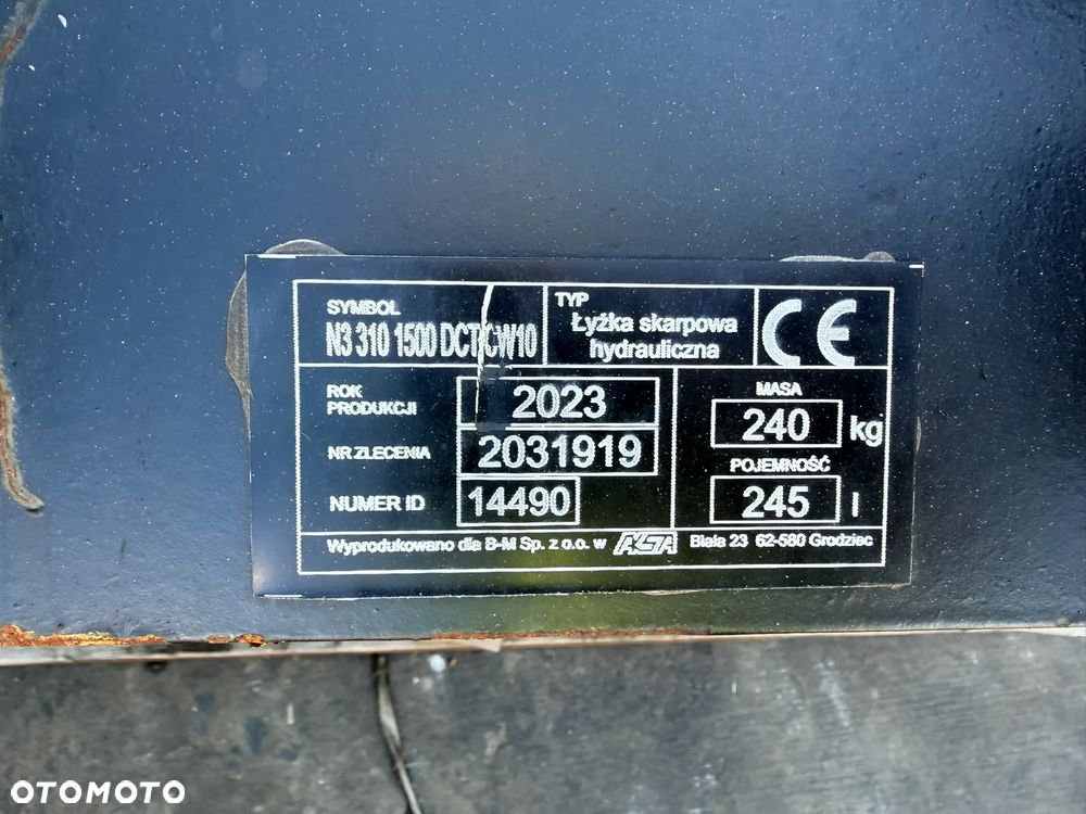 Caterpillar 310 - 23