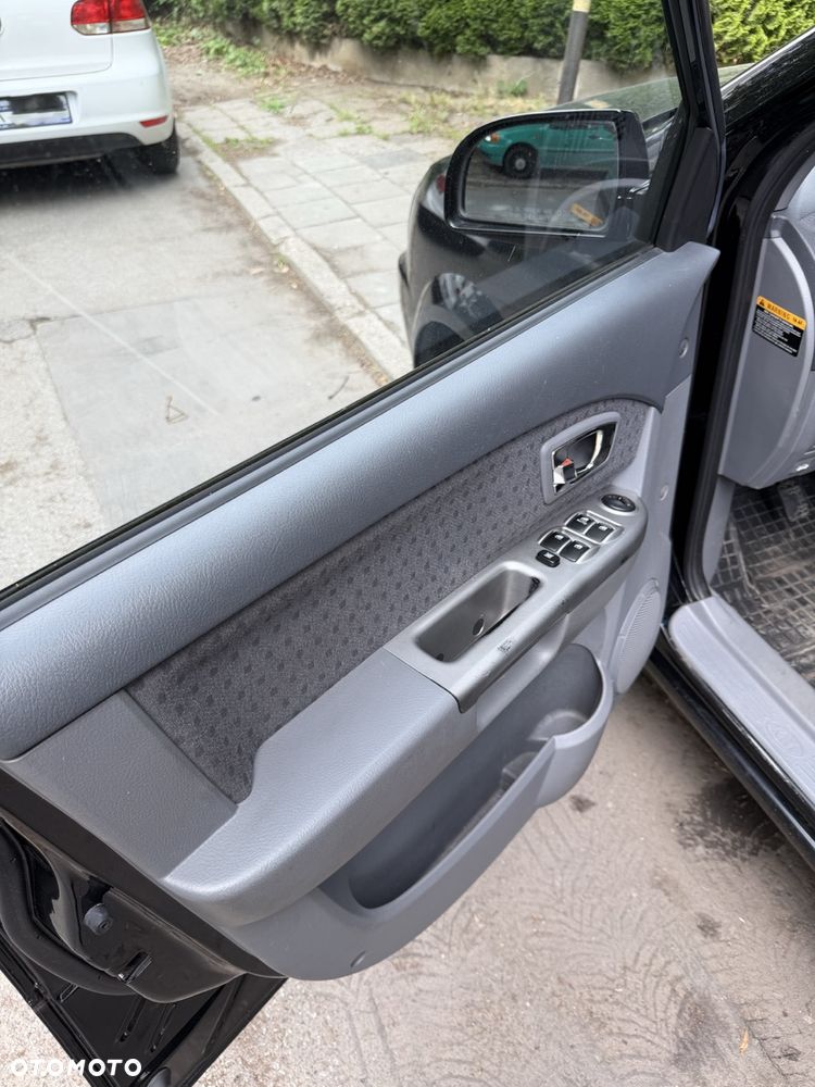 Kia Carens 2.0 EX - 9